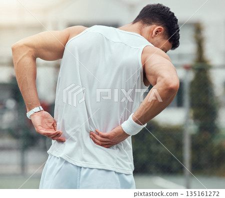 Fitness, back pain and man in city for running, workout or cardio with hurt, bruise or problem. Sports, injury and male runner outdoor with spine, muscle or bone, arthritis and sports accident 135161272