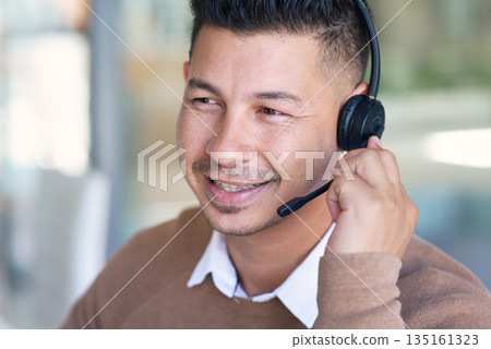 Man, face and callcenter with CRM and contact us, communication with headset and phone call in office. Male consultant smile in customer service, telemarketing or tech support with help desk job Man, face and callcenter with CRM and contact us, communication with headset and phone call in office. Male consultant smile in customer service, telemarketing or tech support with help desk job 135161323
