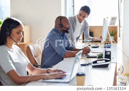 Call center, crm or support with a manager and consultant at work in an office for assistance. Contact us, customer service or consulting with hr management training an employee in telemarketing Call center, crm or support with a manager and consultant at work in an office for assistance. Contact us, customer service or consulting with hr management training an employee in telemarketing 135161524