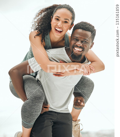 Happy people in portrait, piggyback and hiking outdoor with smile, fun and fitness with interracial couple. Excited, workout together and trekking, black man and woman are playful with happiness Happy people in portrait, piggyback and hiking outdoor with smile, fun and fitness with interracial couple. Excited, workout together and trekking, black man and woman are playful with happiness 135161859