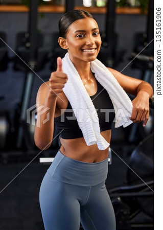 Gym, portrait or happy Indian woman with thumbs up in fitness training with positive mindset or motivation. Wellness, smile or healthy personal trainer in workout with like hand gesture or thumb up Gym, portrait or happy Indian woman with thumbs up in fitness training with positive mindset or motivation. Wellness, smile or healthy personal trainer in workout with like hand gesture or thumb up 135161906