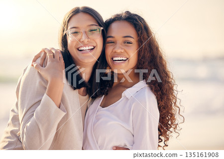 Portrait, lesbian and women hug, beach and love with freedom, equality and romance with happiness. Face, couple and girls embrace, lgbtq relationship and commitment with pride and seaside vacation Portrait, lesbian and women hug, beach and love with freedom, equality and romance with happiness. Face, couple and girls embrace, lgbtq relationship and commitment with pride and seaside vacation 135161908