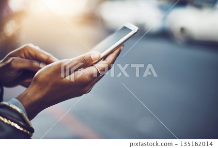 Woman, hands and phone in city for social media, communication or texting on street sidewalk outdoors. Hand of female chatting on mobile smartphone for networking, online browsing or travel in town Woman, hands and phone in city for social media, communication or texting on street sidewalk outdoors. Hand of female chatting on mobile smartphone for networking, online browsing or travel in town 135162014