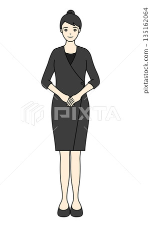 A beauty salon lady in a calm black uniform greets you politely 135162064