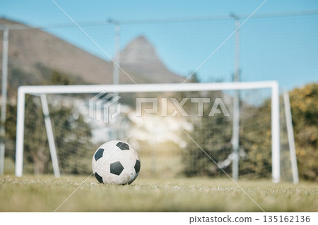 Soccer ball, sports and goal post on empty field for mockup space, fitness and training outdoor. Football club, pitch and event or game for sport competition, exercise and green grass background Soccer ball, sports and goal post on empty field for mockup space, fitness and training outdoor. Football club, pitch and event or game for sport competition, exercise and green grass background 135162136