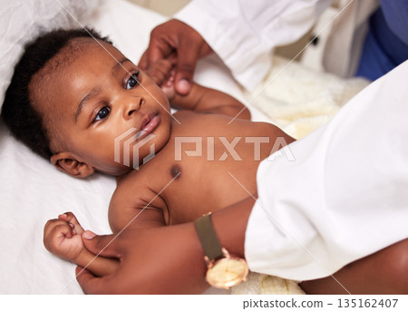 African, little baby and bed for health checkup with doctor or paediatrician with infant or healthcare clinic and medical wellness. Child patient, consulting and expert with toddler in the hospital African, little baby and bed for health checkup with doctor or paediatrician with infant or healthcare clinic and medical wellness. Child patient, consulting and expert with toddler in the hospital 135162407
