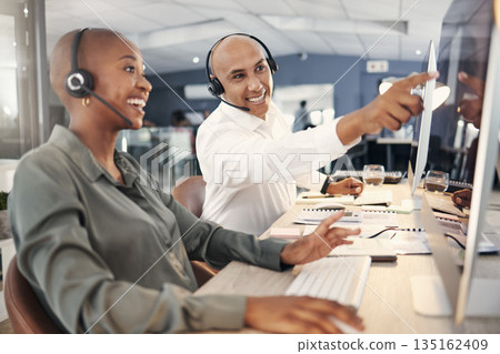 Teamwork, call center and computer for advice or help with account information or sales. Black man and person on training or coaching for customer service ,telemarketing or help desk consultant at pc Teamwork, call center and computer for advice or help with account information or sales. Black man and person on training or coaching for customer service ,telemarketing or help desk consultant at pc 135162409