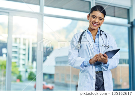 Portrait, doctor and smile of woman with tablet in hospital for research, telehealth or healthcare. Face, happiness and female medical professional with touchscreen tech for online wellness in clinic Portrait, doctor and smile of woman with tablet in hospital for research, telehealth or healthcare. Face, happiness and female medical professional with touchscreen tech for online wellness in clinic 135162617