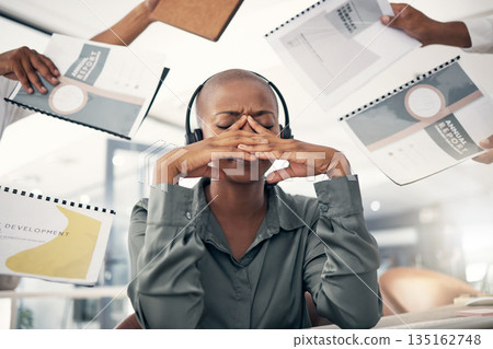 Anxiety, business and black woman with stress, multitasking and annual report deadline with a headache. Female person, consultant and agent with a migraine, chaos and headphones with documents or crm Anxiety, business and black woman with stress, multitasking and annual report deadline with a headache. Female person, consultant and agent with a migraine, chaos and headphones with documents or crm 135162748