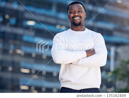 City, happy and portrait of a black man with arms crossed for work, creative expert and happiness. Smile, graphic designer and an African businessman in an urban town with confidence and proud City, happy and portrait of a black man with arms crossed for work, creative expert and happiness. Smile, graphic designer and an African businessman in an urban town with confidence and proud 135162809