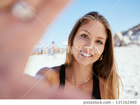 Woman, beach selfie and smile on holiday with beauty, outdoor or summer vacation in sunshine and blog. Girl, happy influencer and photography for travel, social media and portrait in Rio de Janeiro 135162900