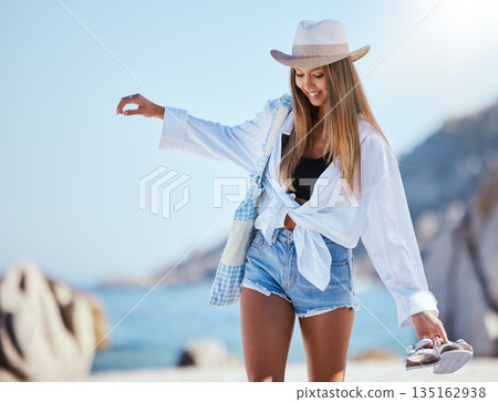 Relax, beach and woman walking, summer vacation and happiness on a weekend break, getaway and tropical island. Female person, traveler and girl on a seaside holiday, travel and adventure with a smile Relax, beach and woman walking, summer vacation and happiness on a weekend break, getaway and tropical island. Female person, traveler and girl on a seaside holiday, travel and adventure with a smile 135162938