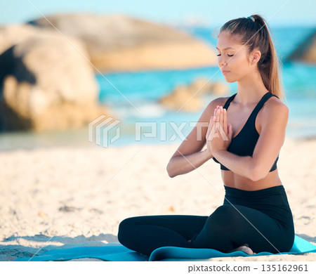 Meditate, beach and yoga in the outdoor with zen for fitness in cape town with mental health. Woman, yogi and exercise with mat at ocean for wellness in summer for self care for balance and health. 135162961