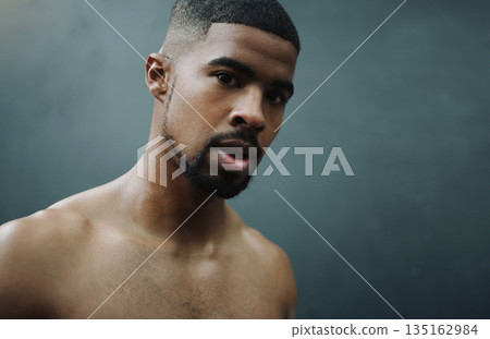 Wall background, fitness and portrait of man in gym for training, exercise and bodybuilder workout. Sports mockup, serious face and male person with determination for challenge, wellness and strength Wall background, fitness and portrait of man in gym for training, exercise and bodybuilder workout. Sports mockup, serious face and male person with determination for challenge, wellness and strength 135162984