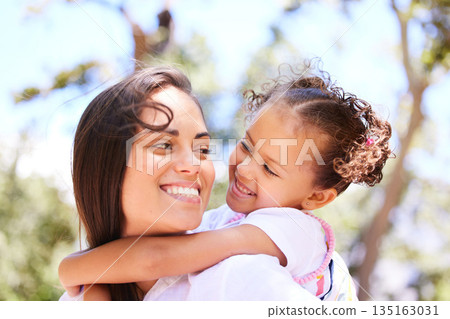 Child, mother and piggyback with family outdoor in nature for summer happiness, love and care. Face of a woman or mom and girl kid playing together at park for adventure, quality time and freedom 135163031