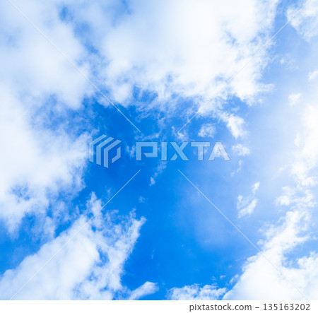 A simple landscape of blue sky and white clouds 135163202