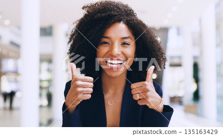 Thumbs up, yes and happy business black woman doing thank you gesture, sign and excited for company success. African, goal and portrait of a corporate or professional employee in agreement with smile 135163429