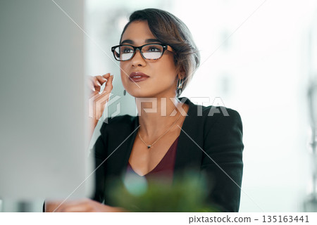 Computer, research and business woman in glasses reflection for reading, online review or editor analysis. Focused Latino person or professional worker in website editing or analytics on desktop pc Computer, research and business woman in glasses reflection for reading, online review or editor analysis. Focused Latino person or professional worker in website editing or analytics on desktop pc 135163441