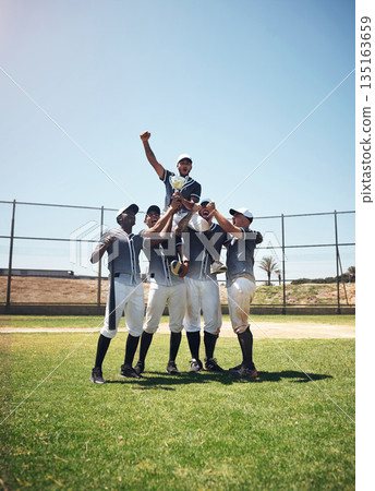 Baseball team, sports and men winning trophy at competition or game on field. Champion athlete friends group celebrate achievement, win or teamwork and fitness prize for professional sport outdoor 135163659