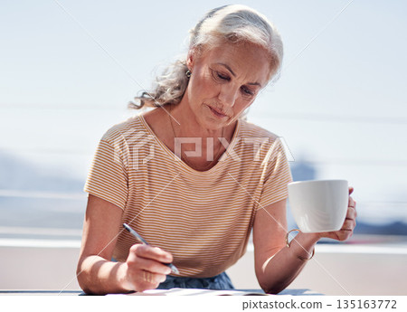 Writing, book and an elderly woman author sitting outdoor in summer for inspiration as a writer. Idea, planning and a female pensioner drinking coffee while using a pen to write in a journal outside 135163772