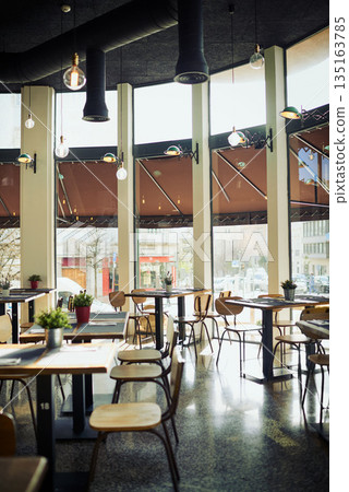 Empty restaurant cafe, diner or coffee shop for retail services, hospitality industry or sales service. Interior design decor, bistro store and trendy small business with furniture, chair and table 135163785