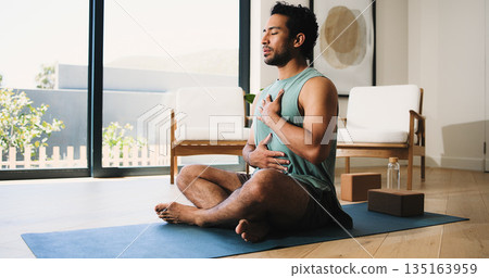 Mindfulness, yoga and man in home, breathing and meditation for inner peace, calm or wellness on mat. Zen, person and spiritual awareness for mental health, yogi and inhale for stress relief on floor Mindfulness, yoga and man in home, breathing and meditation for inner peace, calm or wellness on mat. Zen, person and spiritual awareness for mental health, yogi and inhale for stress relief on floor 135163959