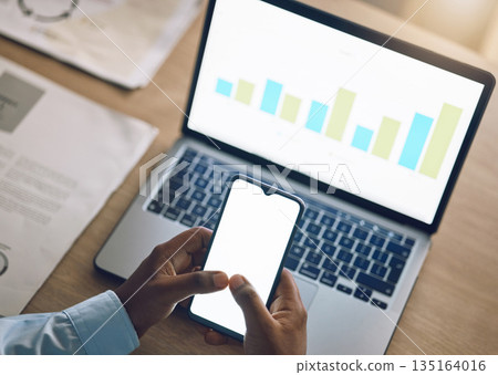 Phone space, business person and data analysis on laptop screen, financial research and increase or growth in graphs. Charts, stats and financial people hands on mobile app, ux ui mockup and computer Phone space, business person and data analysis on laptop screen, financial research and increase or growth in graphs. Charts, stats and financial people hands on mobile app, ux ui mockup and computer 135164016