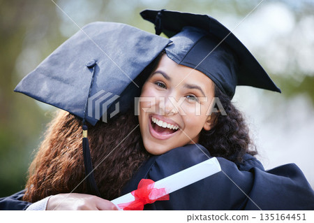 Happy, portrait of friends hugging and on graduation day at college campus outside. Celebration or success, achievement or education and excited students hug together at university outdoors. Happy, portrait of friends hugging and on graduation day at college campus outside. Celebration or success, achievement or education and excited students hug together at university outdoors. 135164451