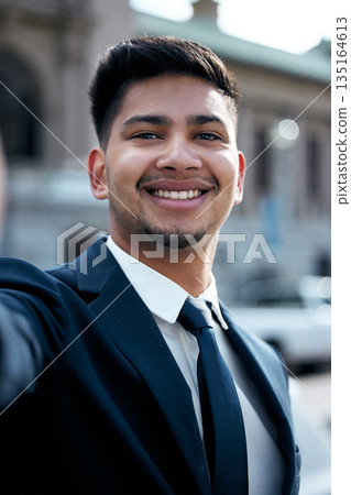 Portrait, lawyer and selfie of business man in city, smile and taking photo for social media in urban street. Face, smile and profile picture of professional, entrepreneur or male attorney from India Portrait, lawyer and selfie of business man in city, smile and taking photo for social media in urban street. Face, smile and profile picture of professional, entrepreneur or male attorney from India 135164613