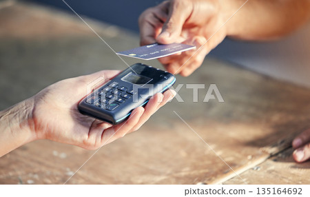 Closeup, hands of person with credit card and wireless pay machine for payment. Subscription or cashier, digital transaction or promotion and customer paying membership with bank information Closeup, hands of person with credit card and wireless pay machine for payment. Subscription or cashier, digital transaction or promotion and customer paying membership with bank information 135164692