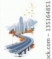 A winding road leading to the city amidst golden leaves. 135164851