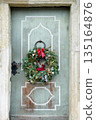 Natural spruce Advent christmas wreath on the vintage wooden door. 135164876