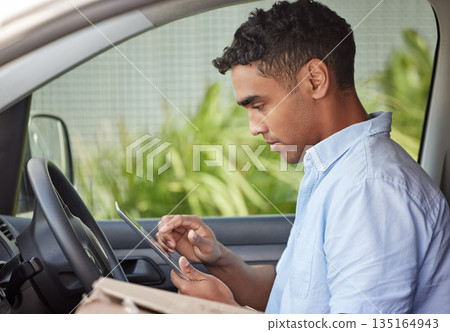 Delivery man in car with tablet, boxes and checking location, order list or online map for logistics. Courier service, driver in van and internet connection for digital logistic schedule with package Delivery man in car with tablet, boxes and checking location, order list or online map for logistics. Courier service, driver in van and internet connection for digital logistic schedule with package 135164943