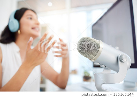 Audio, microphone or woman live streaming a podcast media or online radio on broadcast network. Influencer host, blurry presenter or girl journalist reporter talking, recording or speaking of news 135165144