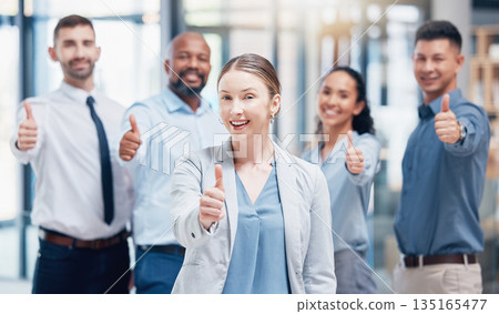 Thumbs up, business people in portrait with woman boss at startup with confidence and pride at law firm. Teamwork, commitment and vision for happy legal team with yes hand sign in startup office. Thumbs up, business people in portrait with woman boss at startup with confidence and pride at law firm. Teamwork, commitment and vision for happy legal team with yes hand sign in startup office. 135165477