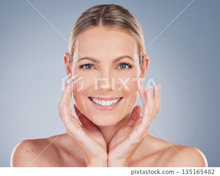 Happy, skincare and portrait of woman in studio for facial, cosmetics and natural makeup. Self care, wellness and mockup with face of female model on grey background for glow, happiness and collagen Happy, skincare and portrait of woman in studio for facial, cosmetics and natural makeup. Self care, wellness and mockup with face of female model on grey background for glow, happiness and collagen 135165482