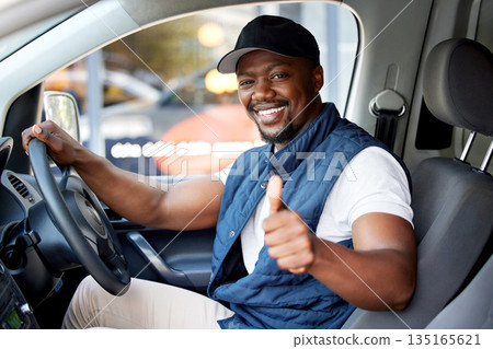 Delivery guy, transport or man driving with thumbs up, shipping or courier service. Happy black person, portrait or driver for like, support emoji or hand sign in van, cargo vehicle or transportation Delivery guy, transport or man driving with thumbs up, shipping or courier service. Happy black person, portrait or driver for like, support emoji or hand sign in van, cargo vehicle or transportation 135165621