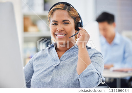 Business woman, telemarketing portrait and call center consultation in a office working on computer. Smile, African female worker and web support advice of contact us employee with professional job 135166084