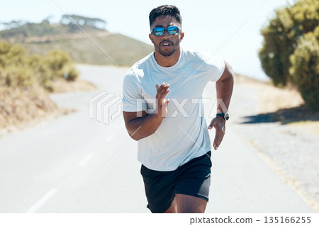 Man, fitness and running in nature for workout, cardio exercise or training outdoors. Fit, active and sporty male person, athlete or runner exercising on mountain asphalt, road or street outside Man, fitness and running in nature for workout, cardio exercise or training outdoors. Fit, active and sporty male person, athlete or runner exercising on mountain asphalt, road or street outside 135166255