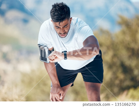 Timer, watch and athlete training heart rate for outdoor sports, marathon or cardio strength with mountain exercise. Rest, smartwatch and young man running or runner workout for fitness or wellness Timer, watch and athlete training heart rate for outdoor sports, marathon or cardio strength with mountain exercise. Rest, smartwatch and young man running or runner workout for fitness or wellness 135166270