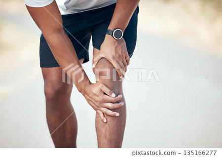 Running, knee pain and closeup of man in city for inflammation, accident and emergency. Fitness, workout and training with legs of male runner in road for muscle ache, sports injury and first aid Running, knee pain and closeup of man in city for inflammation, accident and emergency. Fitness, workout and training with legs of male runner in road for muscle ache, sports injury and first aid 135166277