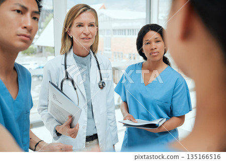 Teamwork, talking or doctors with leadership in meeting planning a surgery strategy in collaboration. Discussion, nurses or surgeons speaking of healthcare paperwork documents or research report 135166516