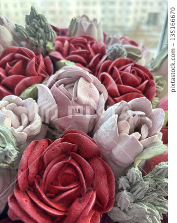 Marshmallow flowers of different colors close-up. The work of a marshmallow manufacturer entrepreneur. 135166670