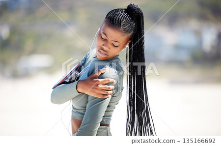 Black woman, shoulder pain and injury outdoor during exercise, running or training. Arthritis, fitness and arm of person with fibromyalgia, wound problem or emergency accident during sports mockup. Black woman, shoulder pain and injury outdoor during exercise, running or training. Arthritis, fitness and arm of person with fibromyalgia, wound problem or emergency accident during sports mockup. 135166692