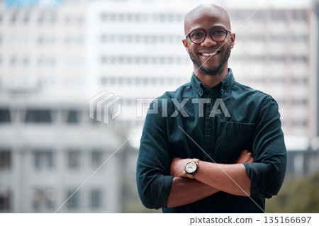 Portrait, black man and arms crossed in office of business, corporate company or employee, worker in workplace. Happy, face and businessman with professional mindset, success in career or confidence Portrait, black man and arms crossed in office of business, corporate company or employee, worker in workplace. Happy, face and businessman with professional mindset, success in career or confidence 135166697