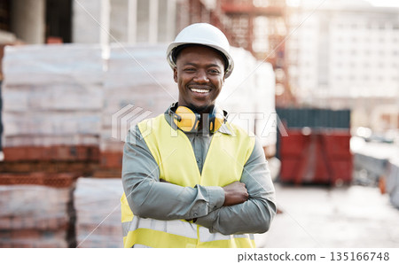 Black man, portrait smile and arms crossed for construction, project management or architecture in city. Happy African male person, engineer or architect smiling in confidence for industrial building Black man, portrait smile and arms crossed for construction, project management or architecture in city. Happy African male person, engineer or architect smiling in confidence for industrial building 135166748