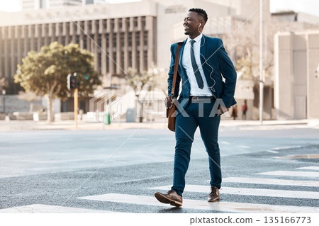 Happy businessman, walking and city to work for travel on street or pedestrian crossing outdoors. Black man on cross road, walk or traveling to business with suit and smile on asphalt in urban town 135166773