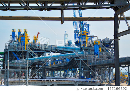 The factory's rugged steel structure The factory's rugged steel structure 135166892