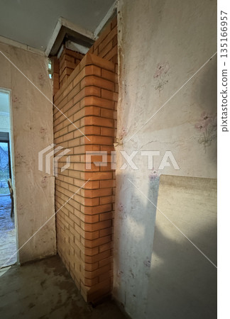 Fresh brickwork of a construction furnace. Rear side. General view. Fresh brickwork of a construction furnace. Rear side. General view. 135166957