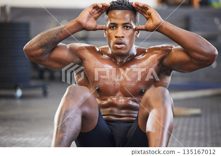 Black man in gym, sweating from sit ups for fitness and abs, exercise routine with muscle and focus. Health, active and determined with core workout, strong male person with sports and training 135167012